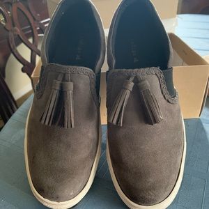 Dark gray suede slip-ons with tassel